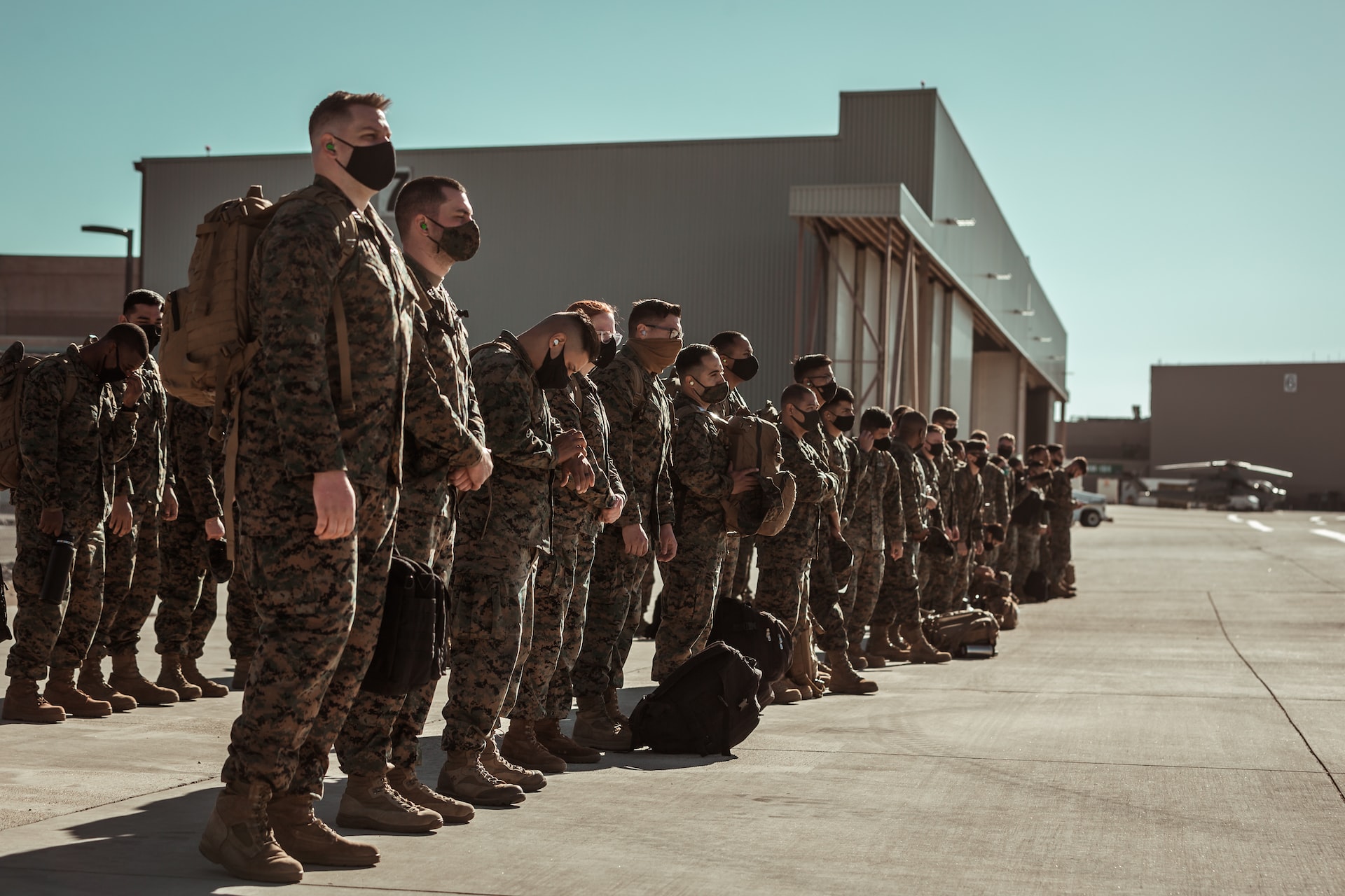men in black and brown camouflage uniform | Veteran Car Donations