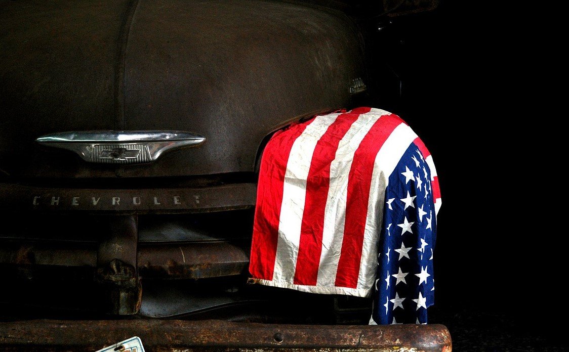 American Flag on a Old Car | Veteran Car Donations