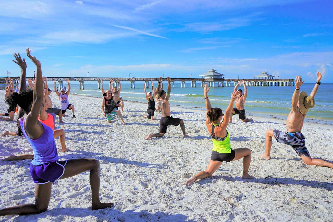 Group Yoga at a Beach | Veteran Car Donations