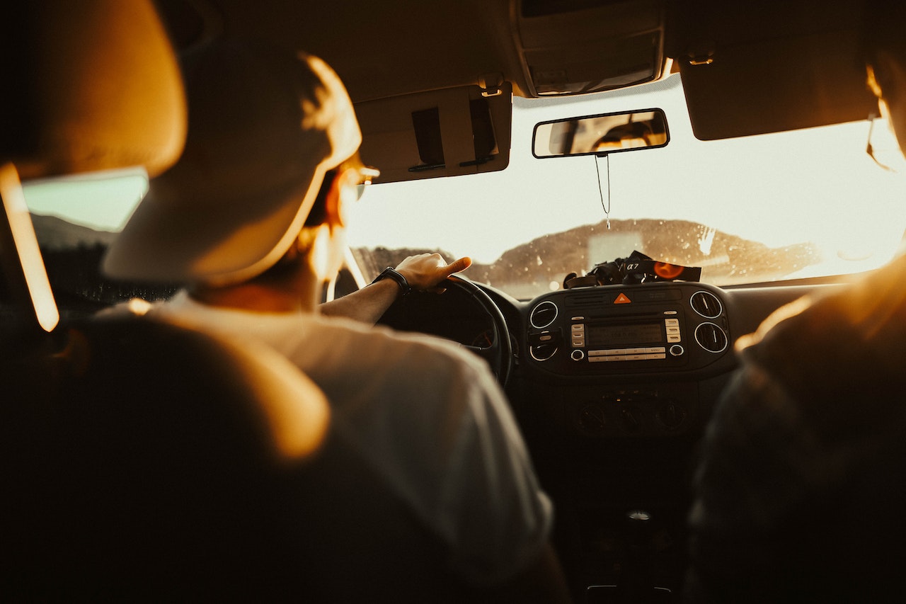 Man Holding the Steering Wheel While Driving | Veteran Car Donations
