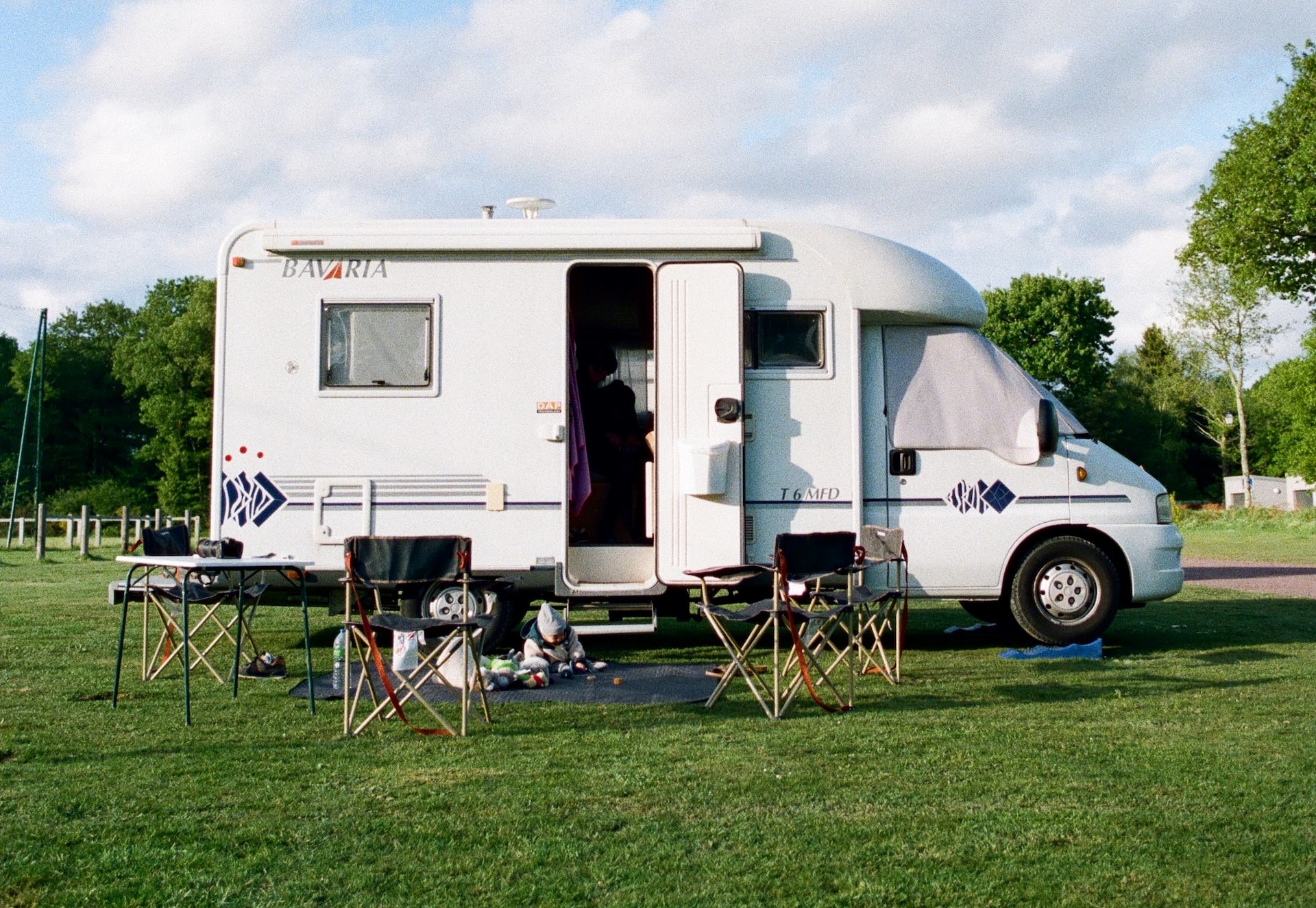 Chairs and Table Outside the RV Trailer | Veteran Car Donations