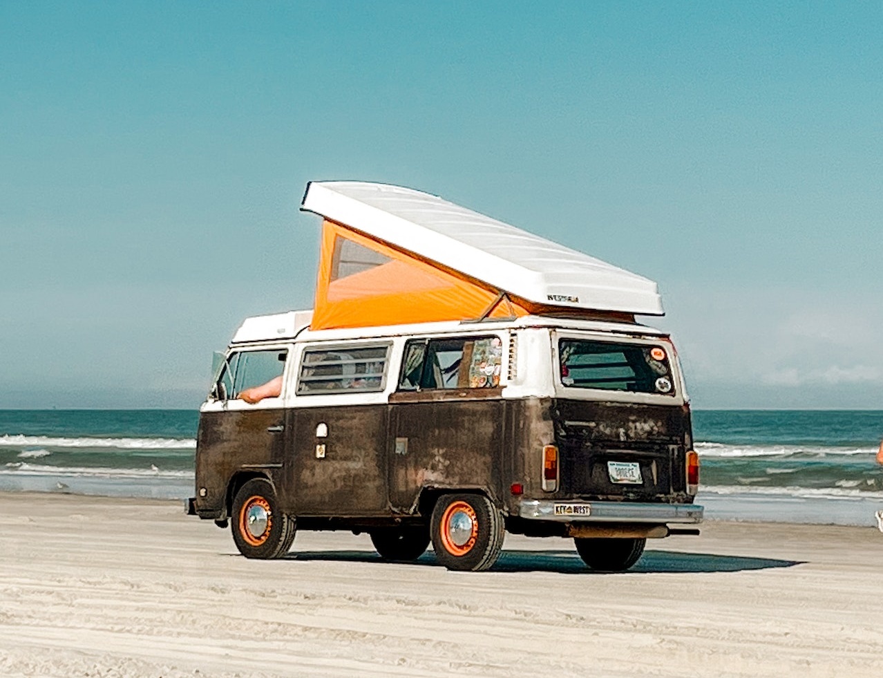 A Van on a beach | Veteran Car Donations