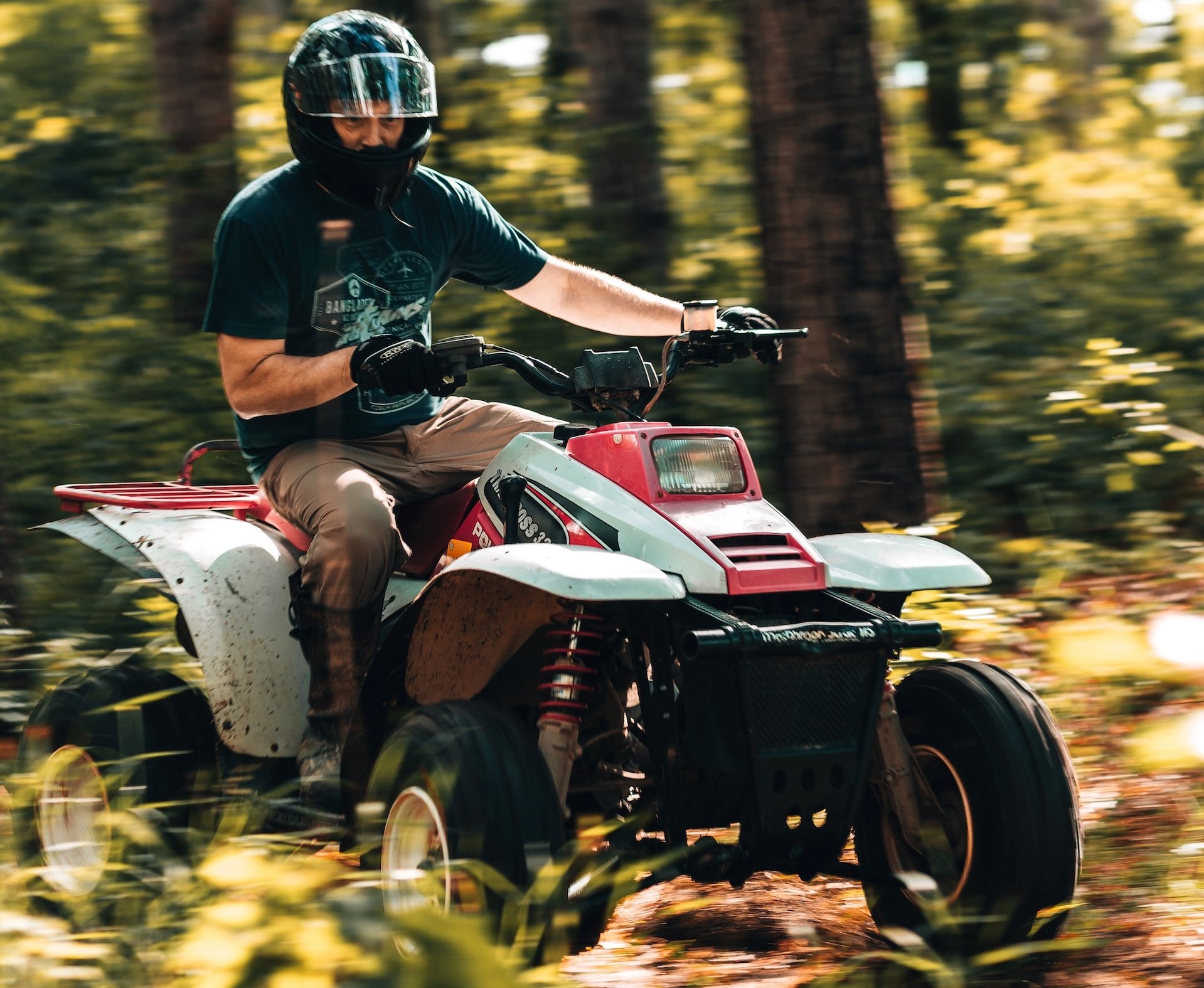 Man Riding ATV | Veteran Car Donations