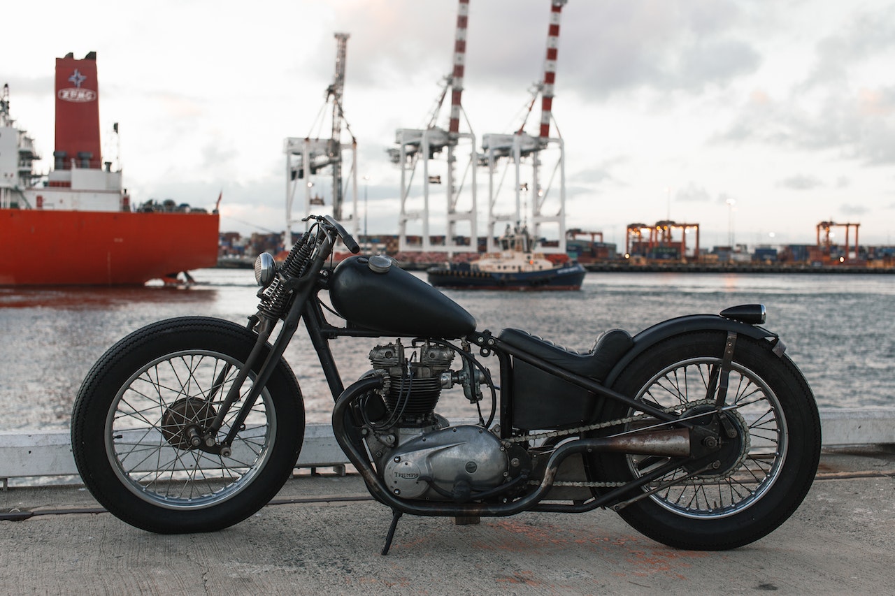 Black Retro Bike Parked in the Port | Veteran Car Donations