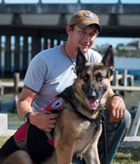 Josh Dreddy with his Rescue Dog Companion - VeteranCarDonations.org