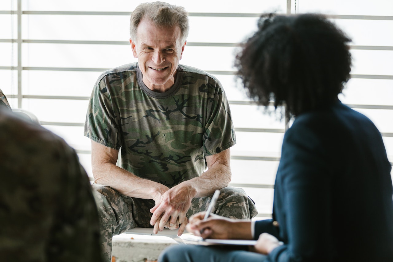 Photo of Soldier Smiling at the Therapist | Veteran Car Donations