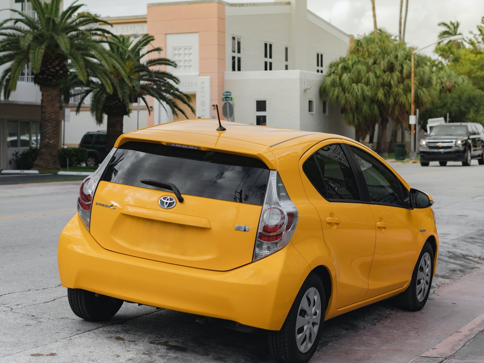 Yellow Toyota on road | Veteran Car Donations