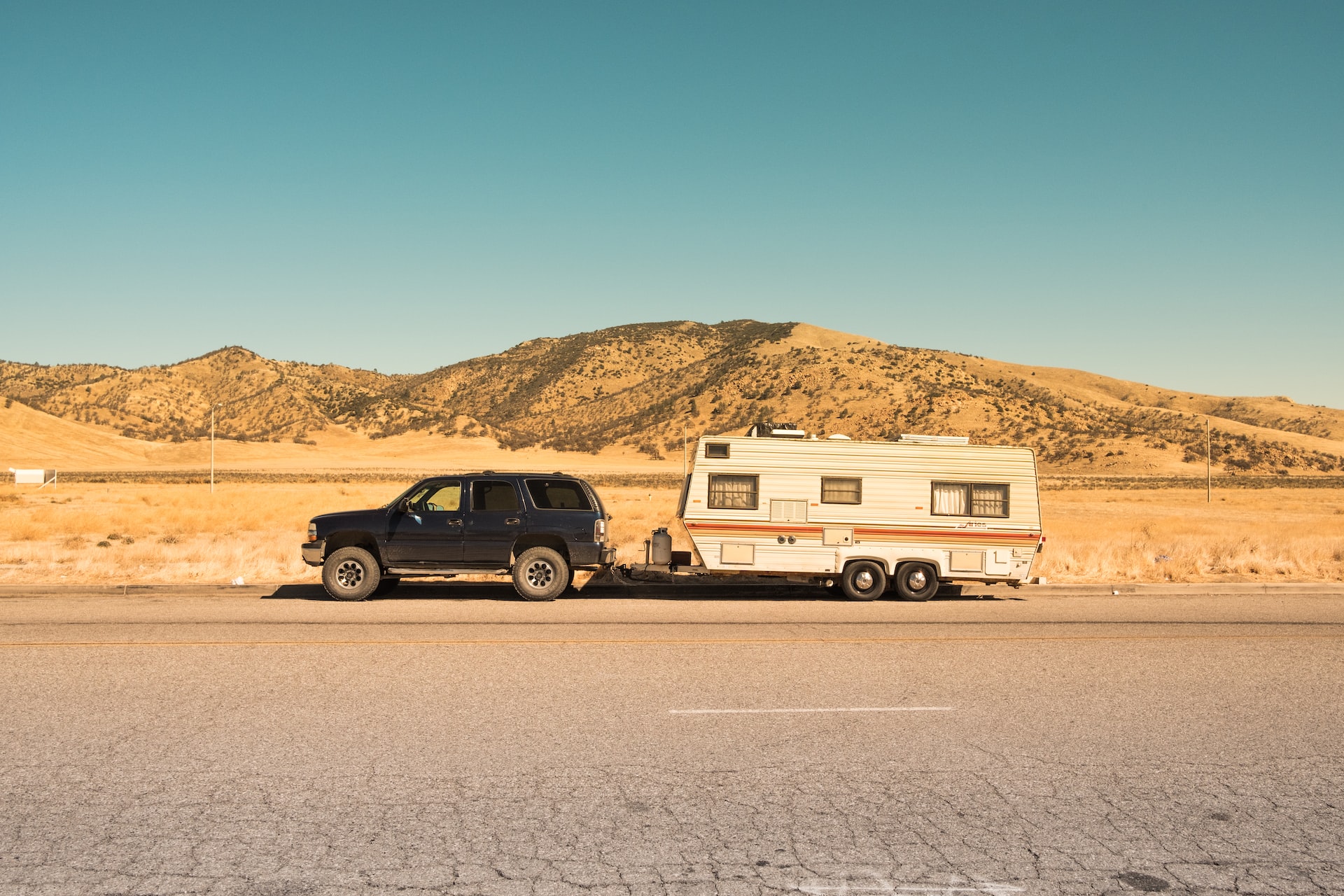 Black Car With White Trailer | Veteran Car Donations