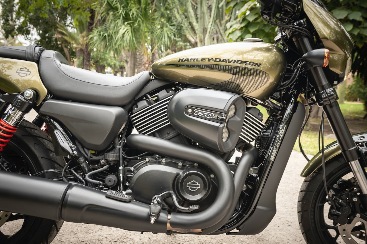 Close-up Photo of Black and Brown Harley Davidosn 750 Parked on | Veteran Car Donations