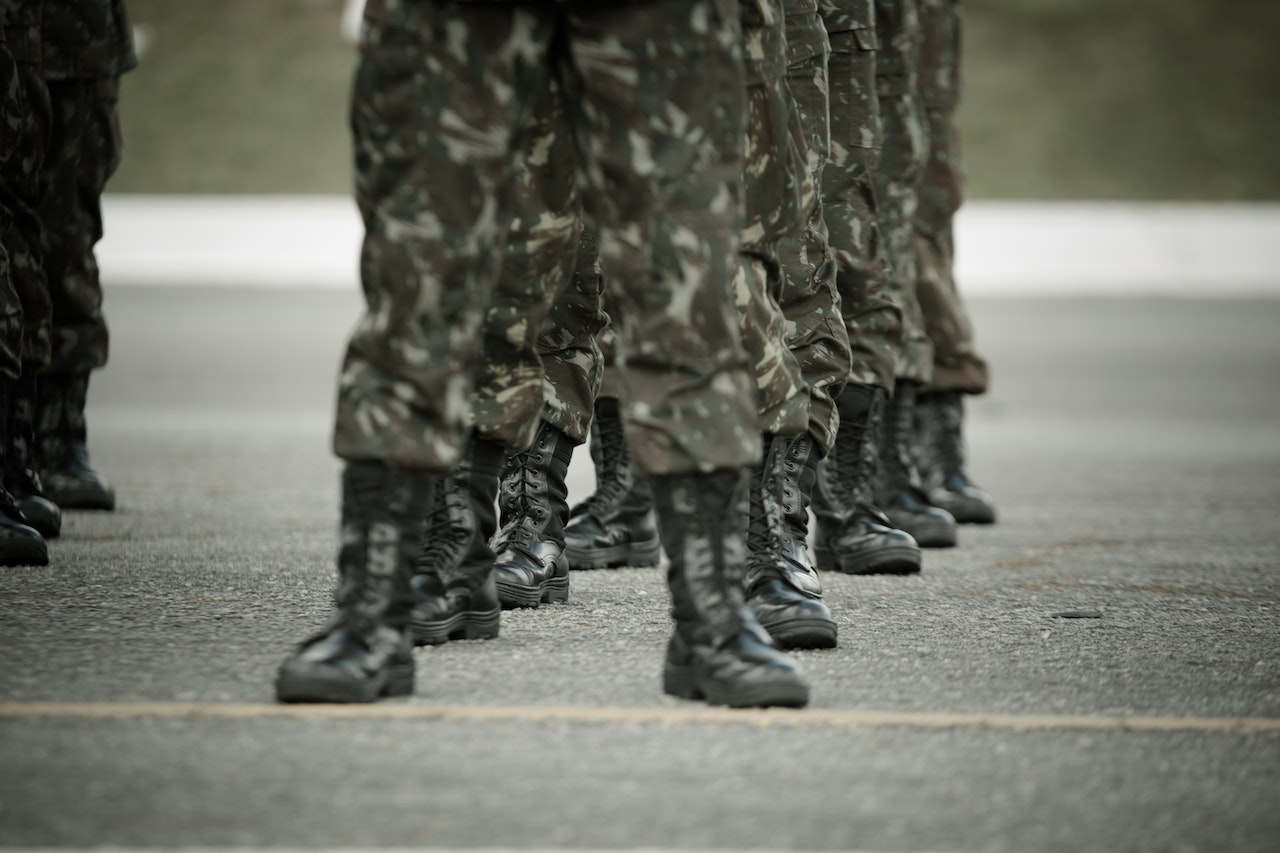 Legs of Soldiers Standing Astride | Veteran Car Donations