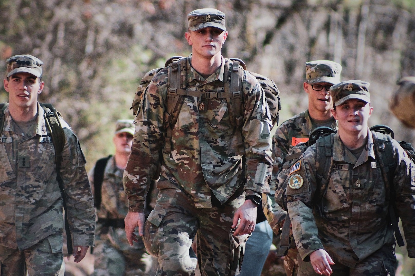 men in camouflage uniform standing on field during daytime | Veteran Car Donations