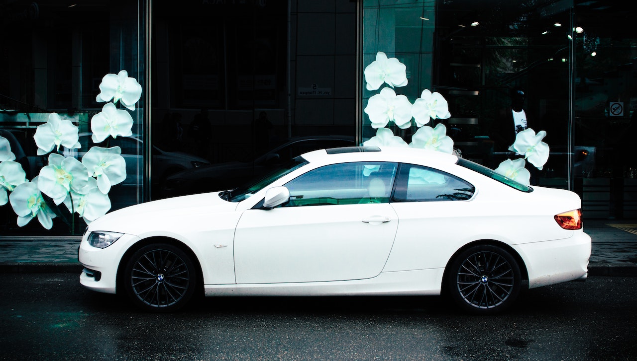 Photo of White Car at the Street | Veteran Car Donations