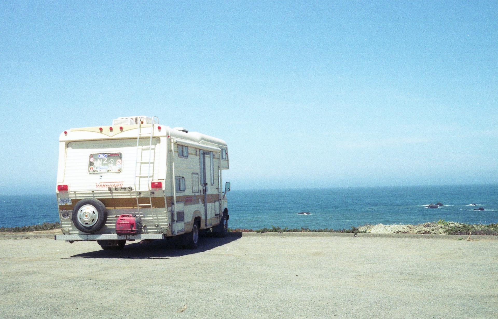 RV parked on beach | Veteran Car Donations