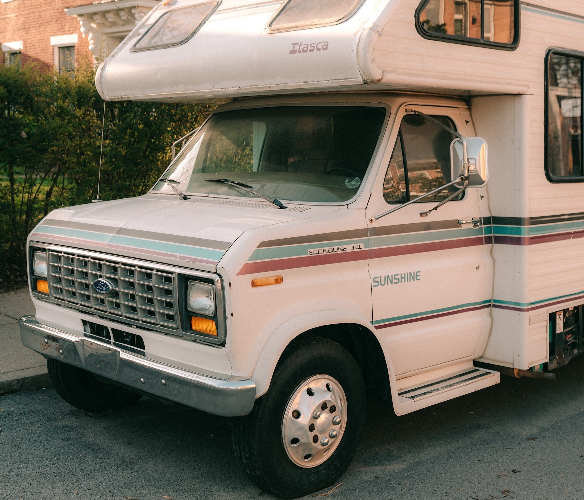 White Rv Parked on the Side of the Street | Veteran Car Donations