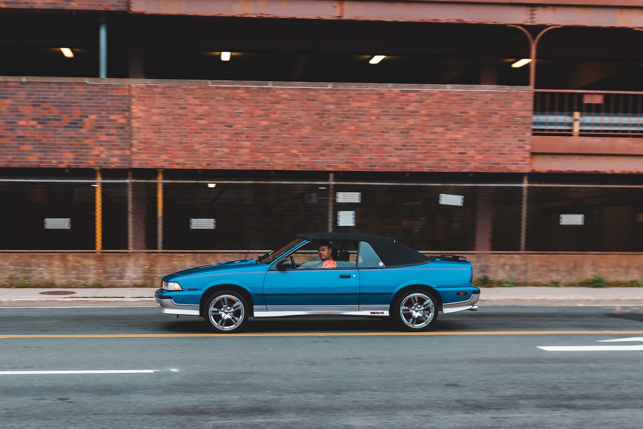 Blue car with convertible top | Veteran Car Donations