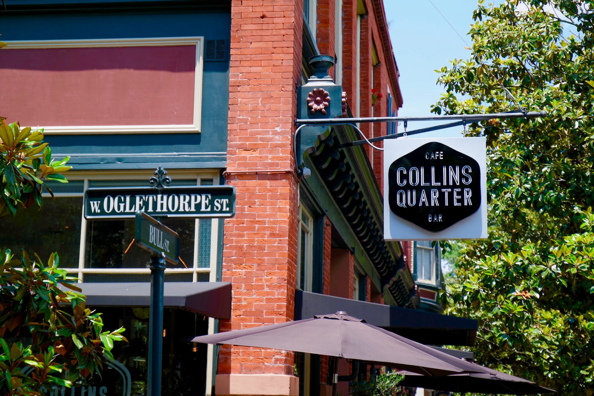 Collins Quarter signage during daytime photo | Veteran Car Donations