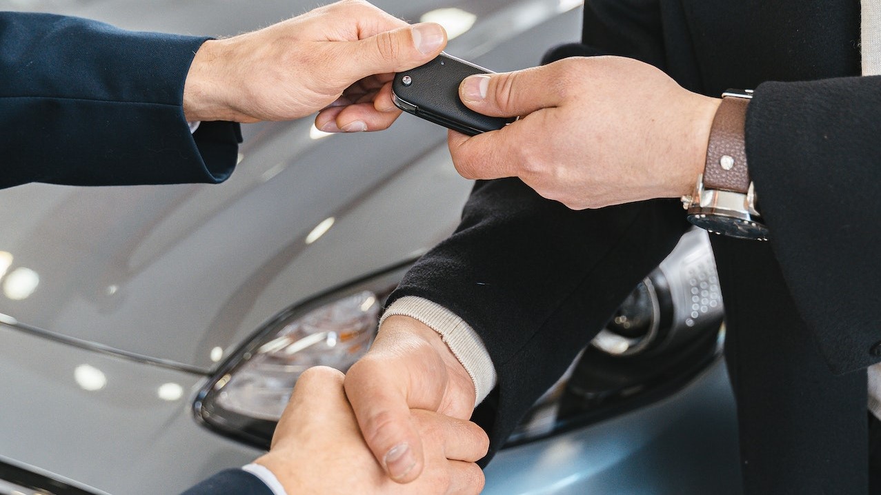 Man Giving Car keys | Veteran Car Donations