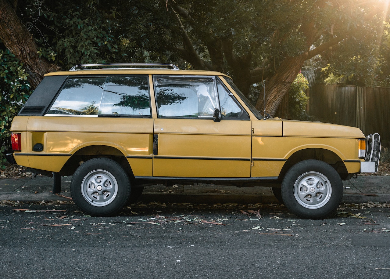 Photo of Parked Yellow SUV | Veteran Car Donations
