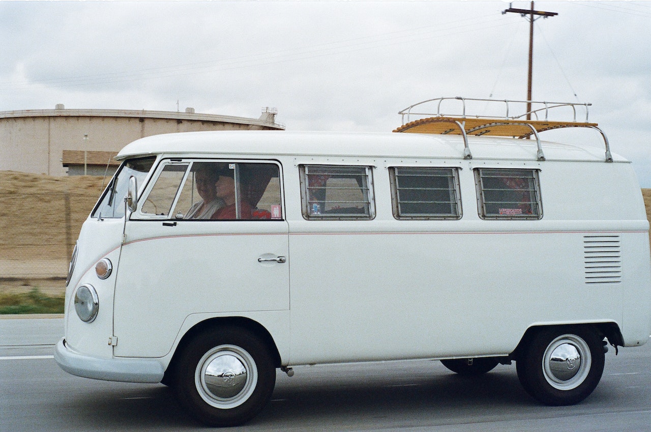 Two Person Riding White Volkswagen T2 | Veteran Car Donations