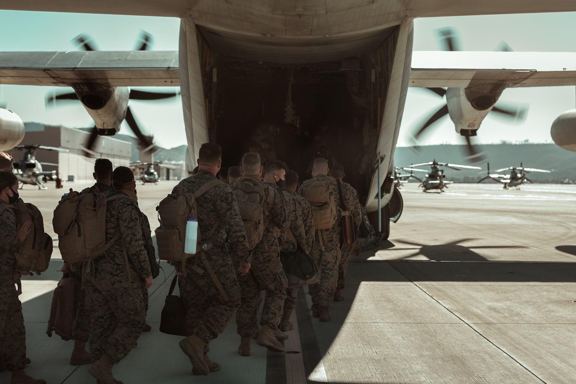 group of men in camouflage uniform standing | Veteran Car Donations