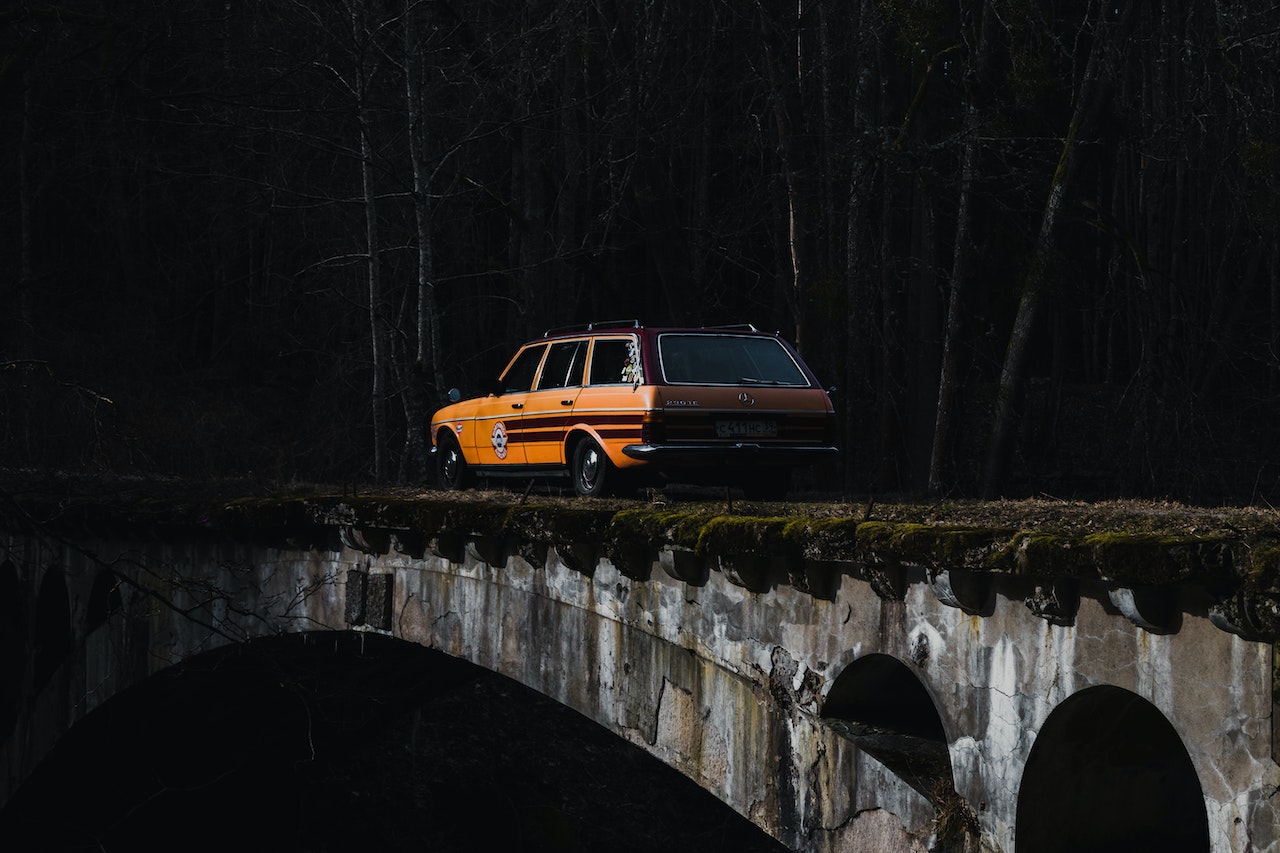 A Station Wagon Crossing the bridge | Veteran Car Donations
