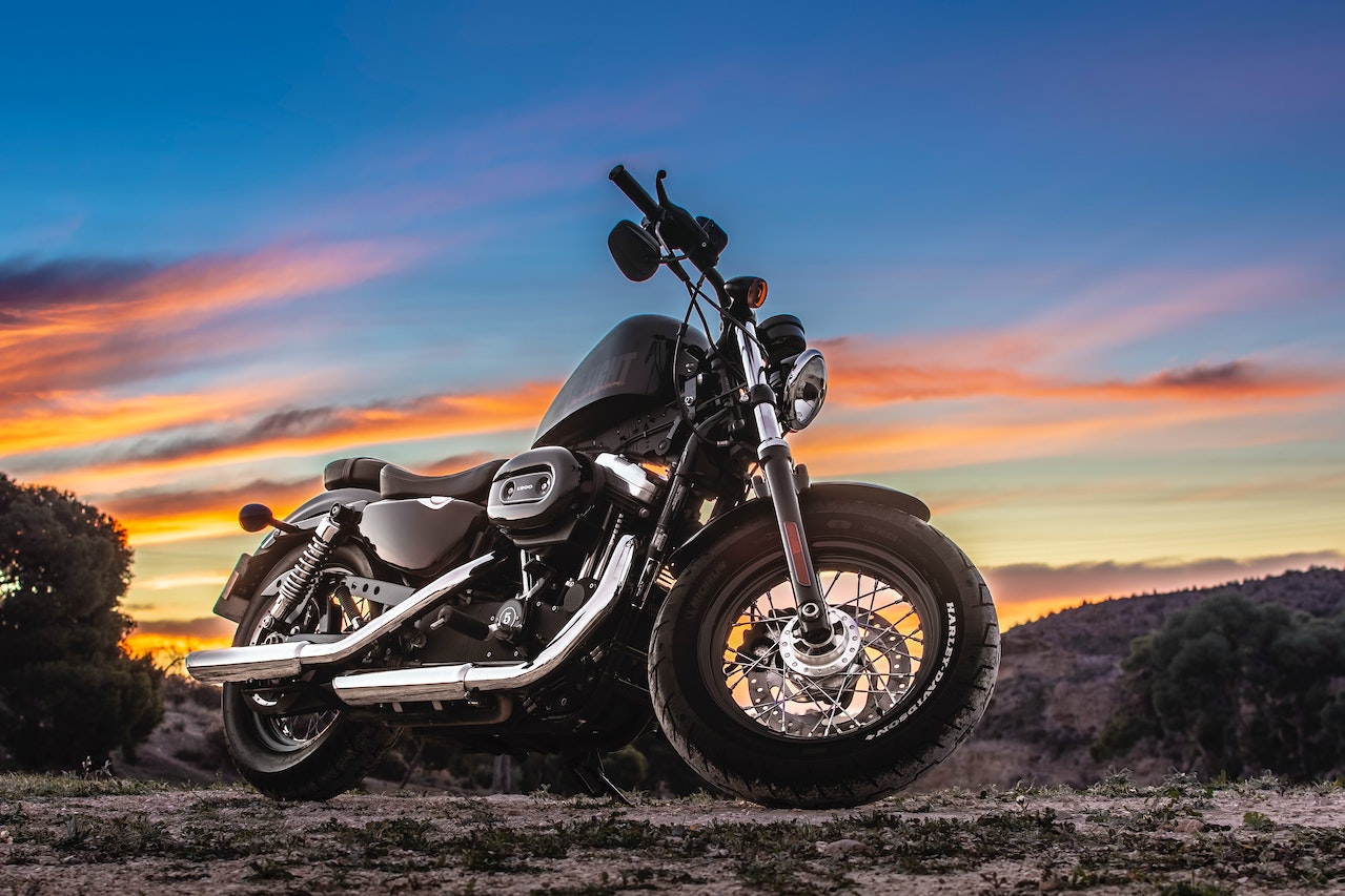 Black Cruiser BIke Parked During Sunset | Veteran Car Donations