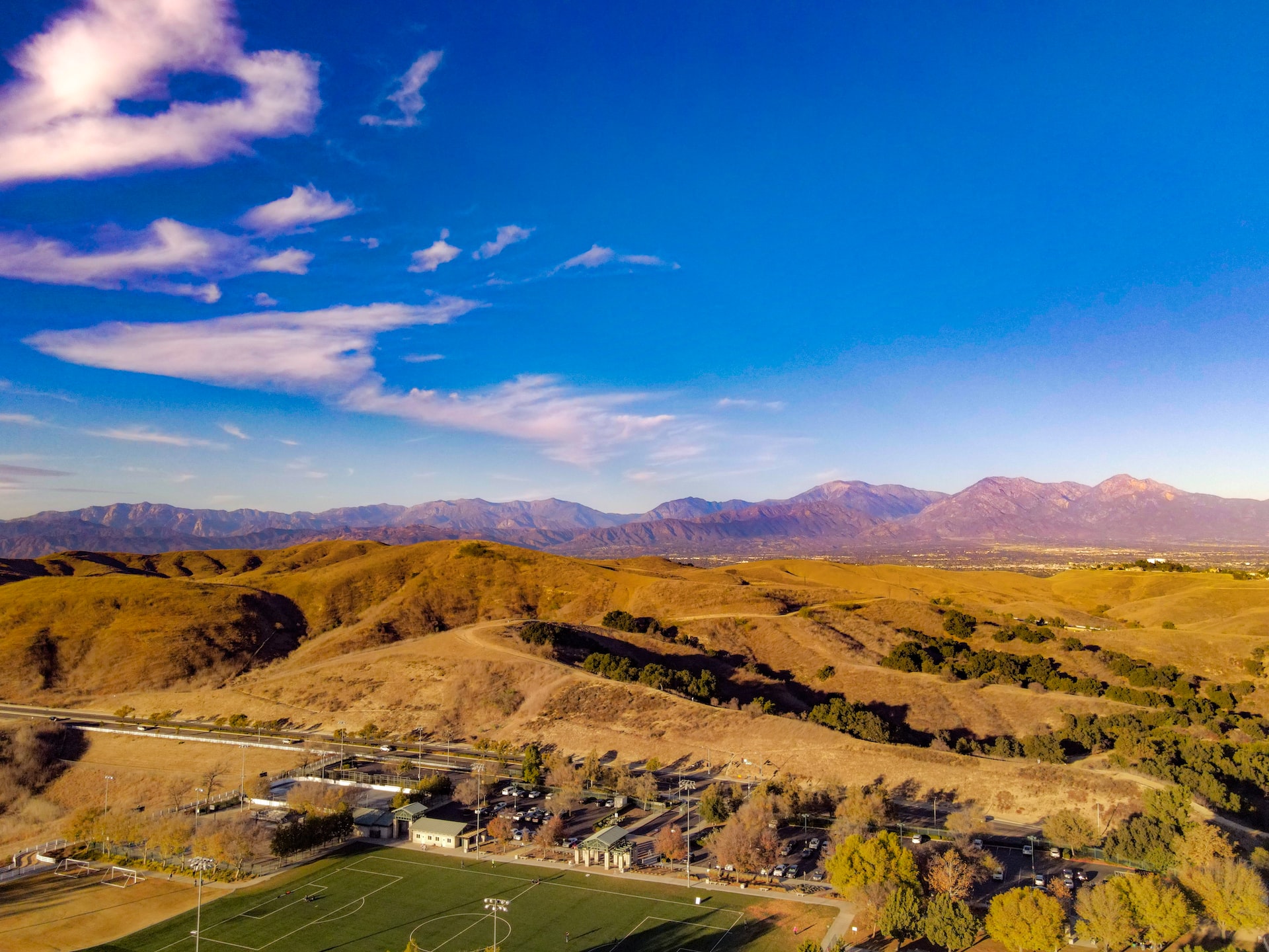 Football Field With Mountain View | Veteran Car Donations