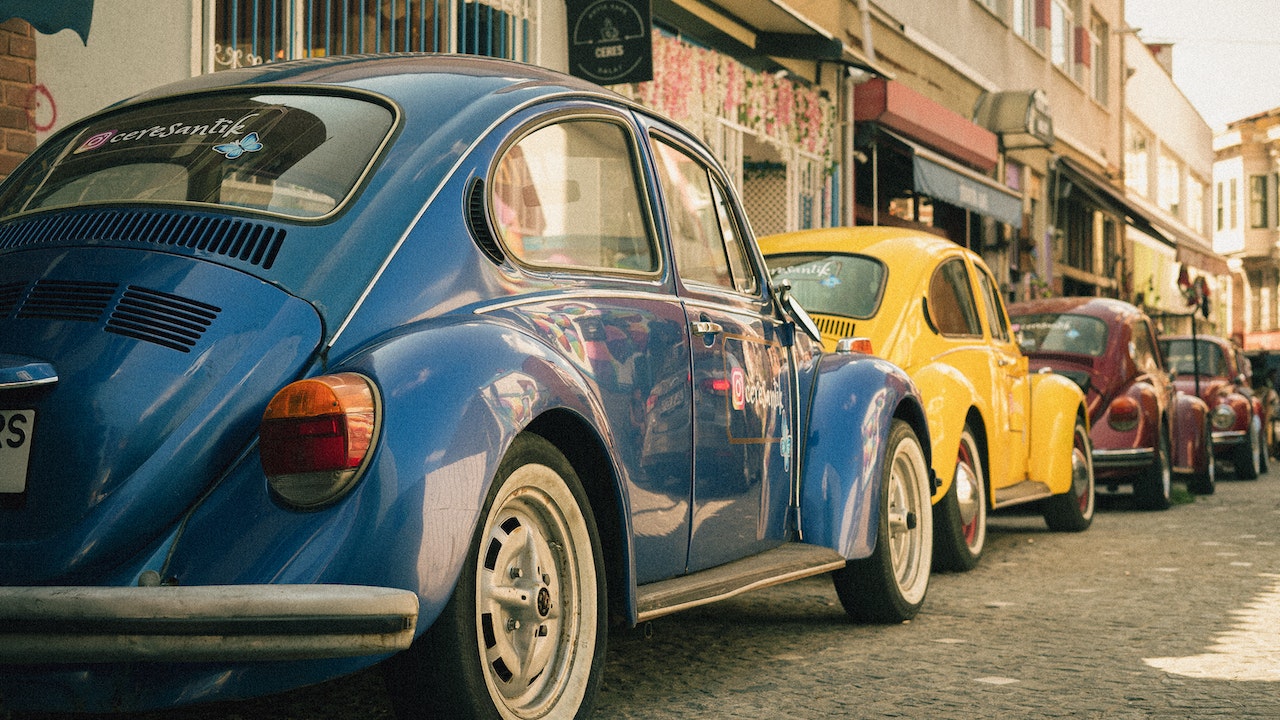 Photo of a Parked Volkswagen Beetles | Veteran Car Donations
