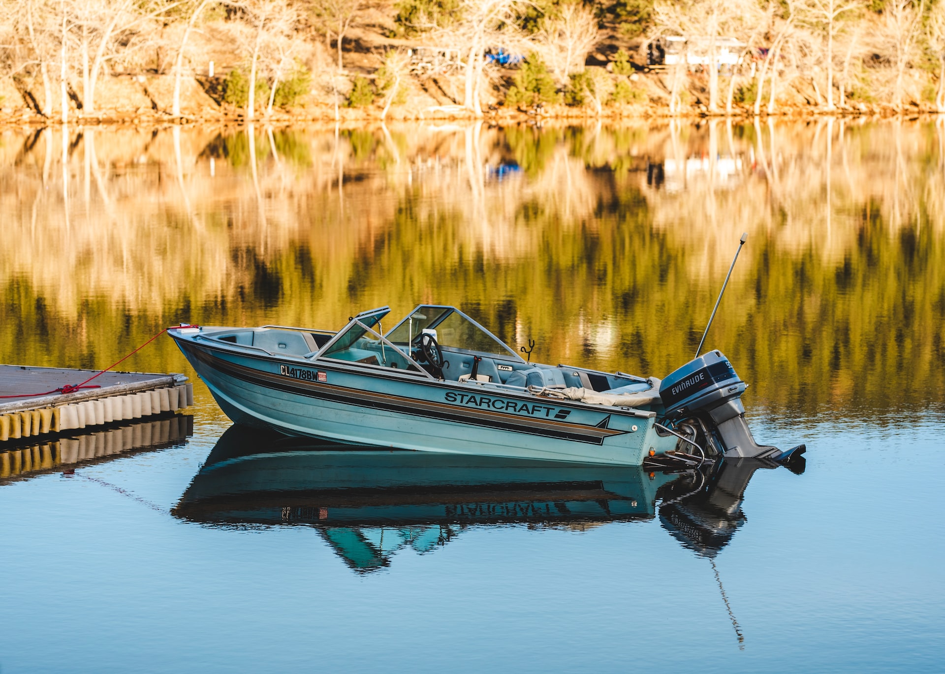 Small boat on a dock | Veteran Car Donations