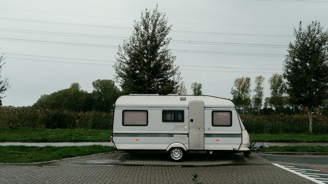 White Caravan Parked | Veteran Car Donations