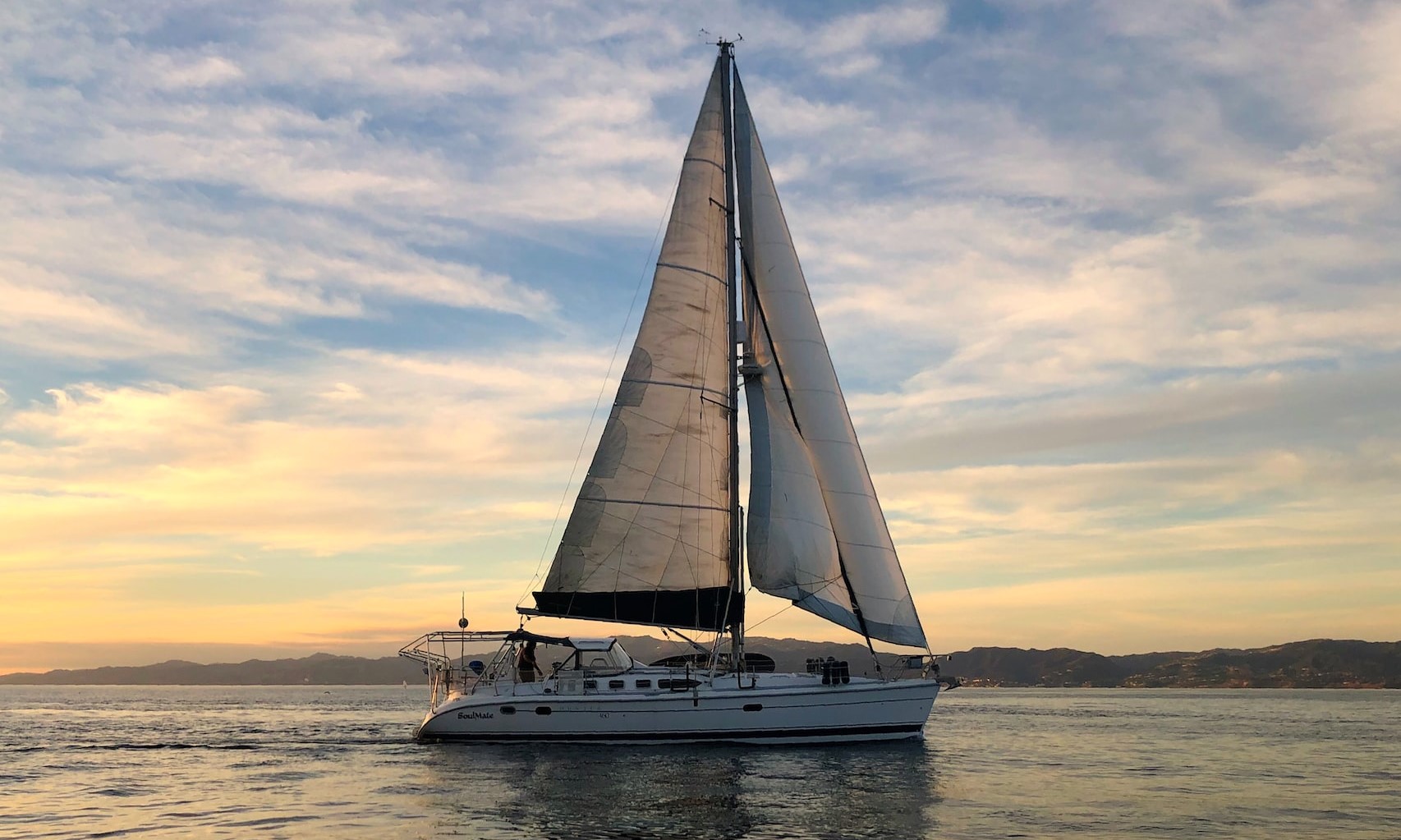 white sail boat on the sea during daytime | Veteran Car Donations