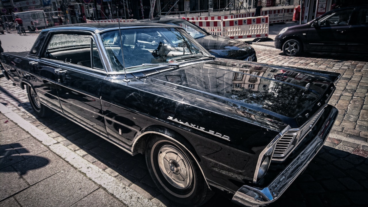 Black Vintage car parked | Veteran Car Donations