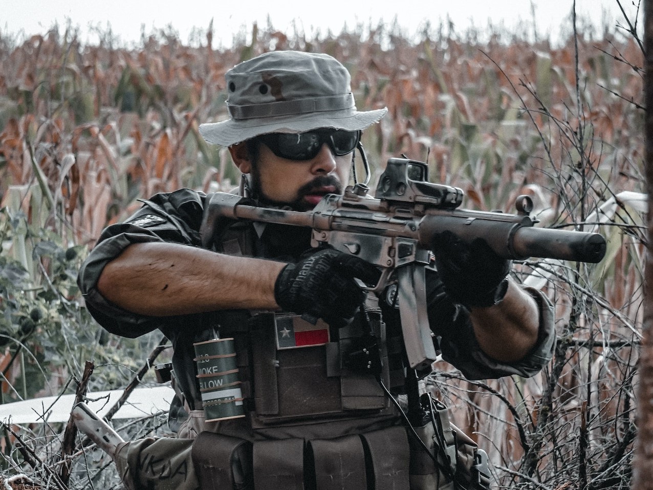 A Soldier Using a Rifle | Veteran Car Donations