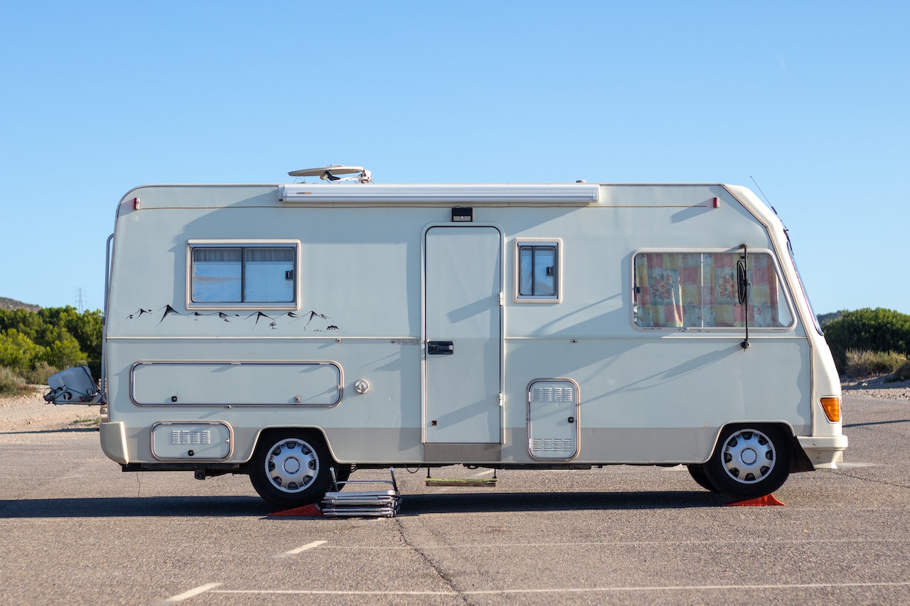 White Camper Van Parked on the Road | Veteran Car Donations