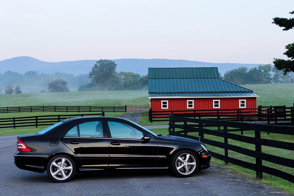 Black Automobile on a Barn - VeteranCarDonations.org