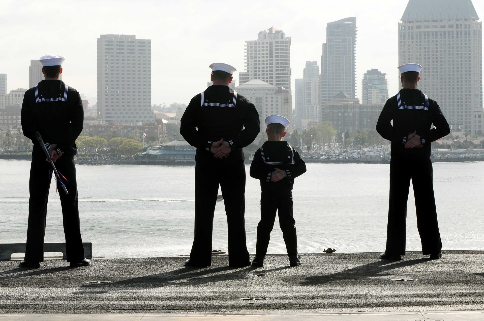 Father And Son Wearing Navy Uniform - VeteranCarDonations.org