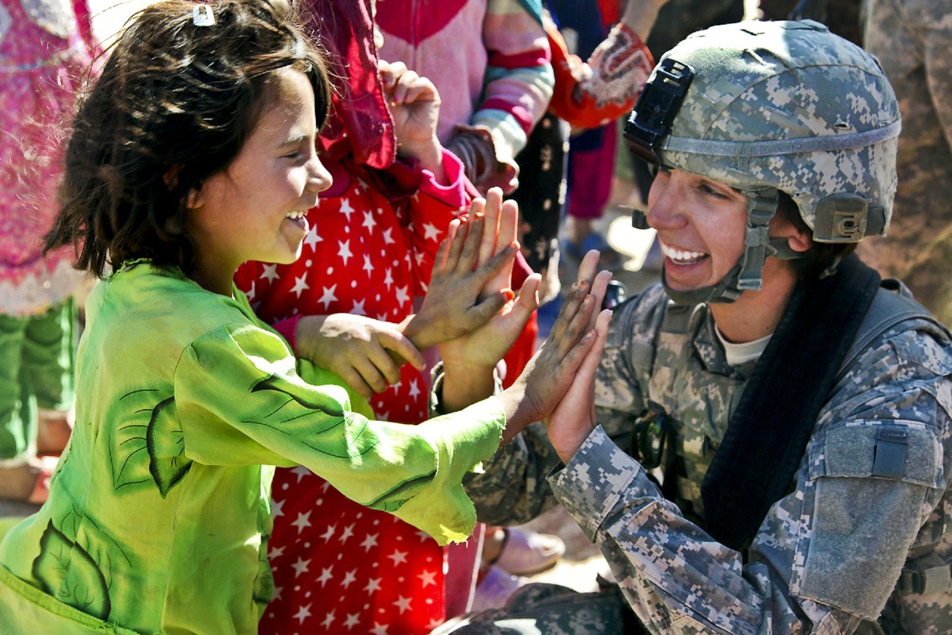 Woman Soldier and Girl