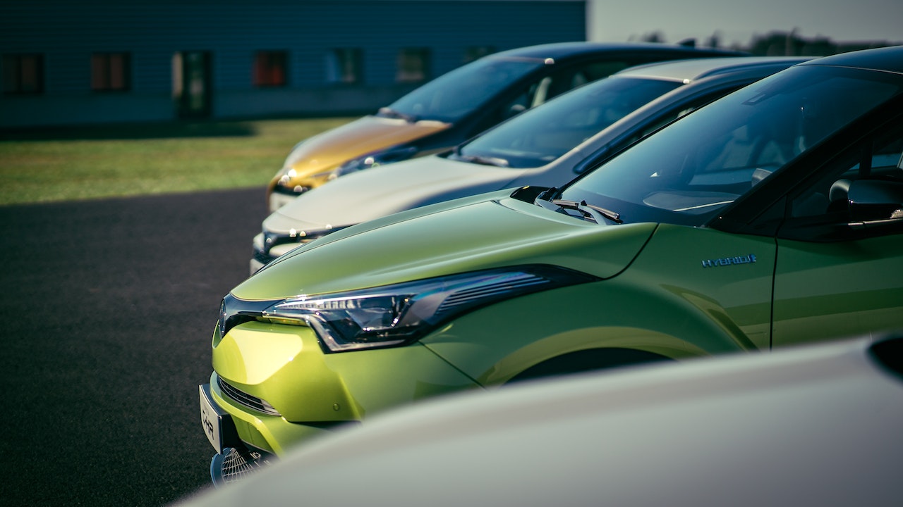 Lined Up Parked Cars on the Road | Veteran Car Donations
