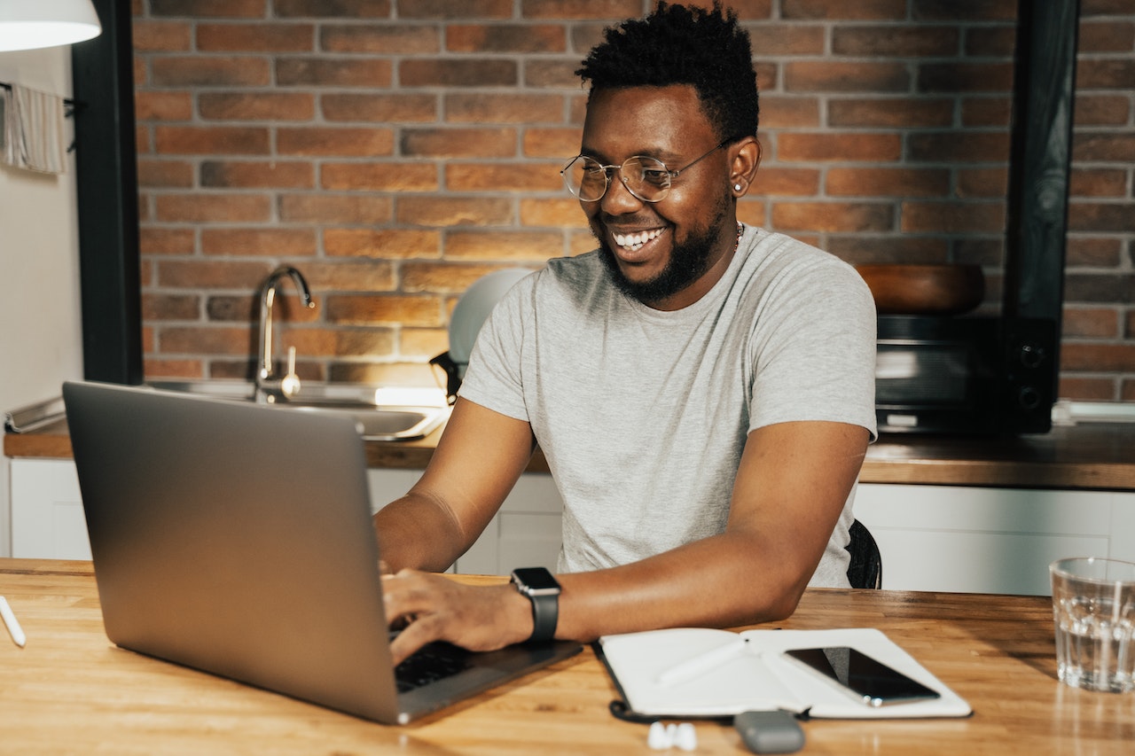 Man Using a Laptop | Veteran Car Donations
