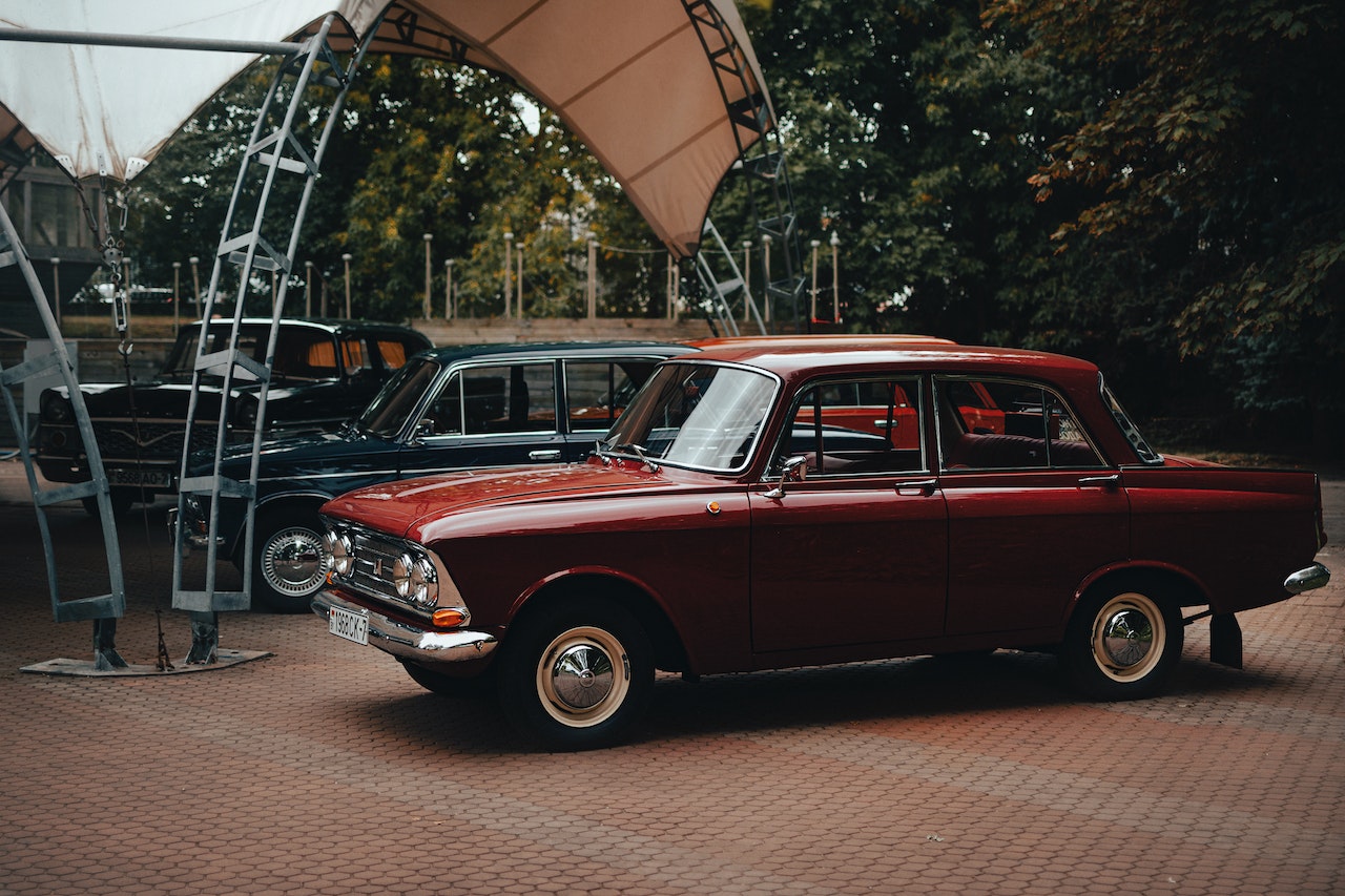 Photo of a Parked Red Classic Car | Veteran Car Donations