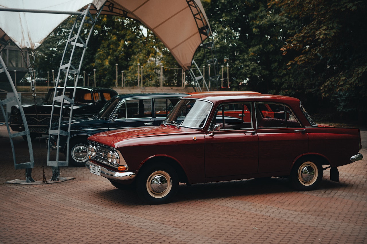 Photo of a Parked Red Classic Car | Veteran Car Donations
