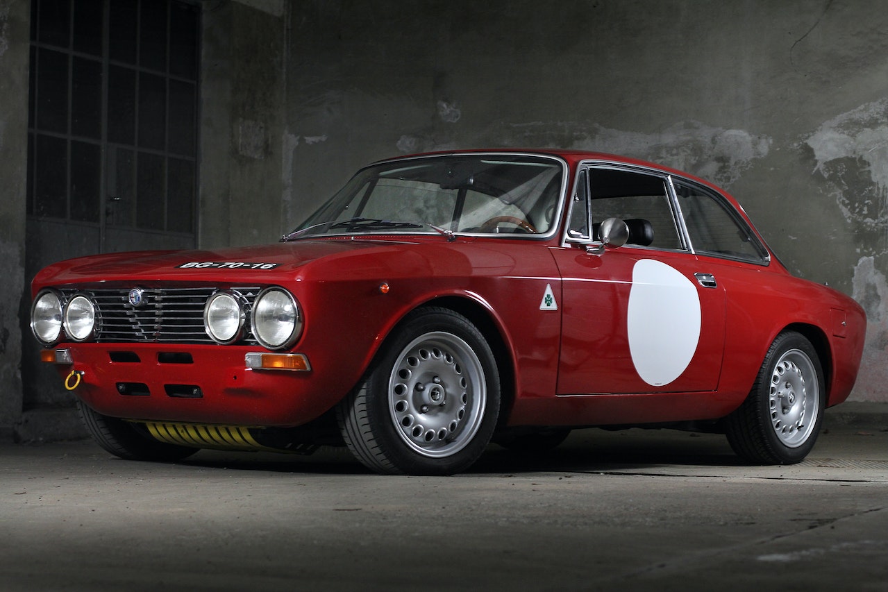 Vintage Red Car Inside Garage | Veteran Car Donations