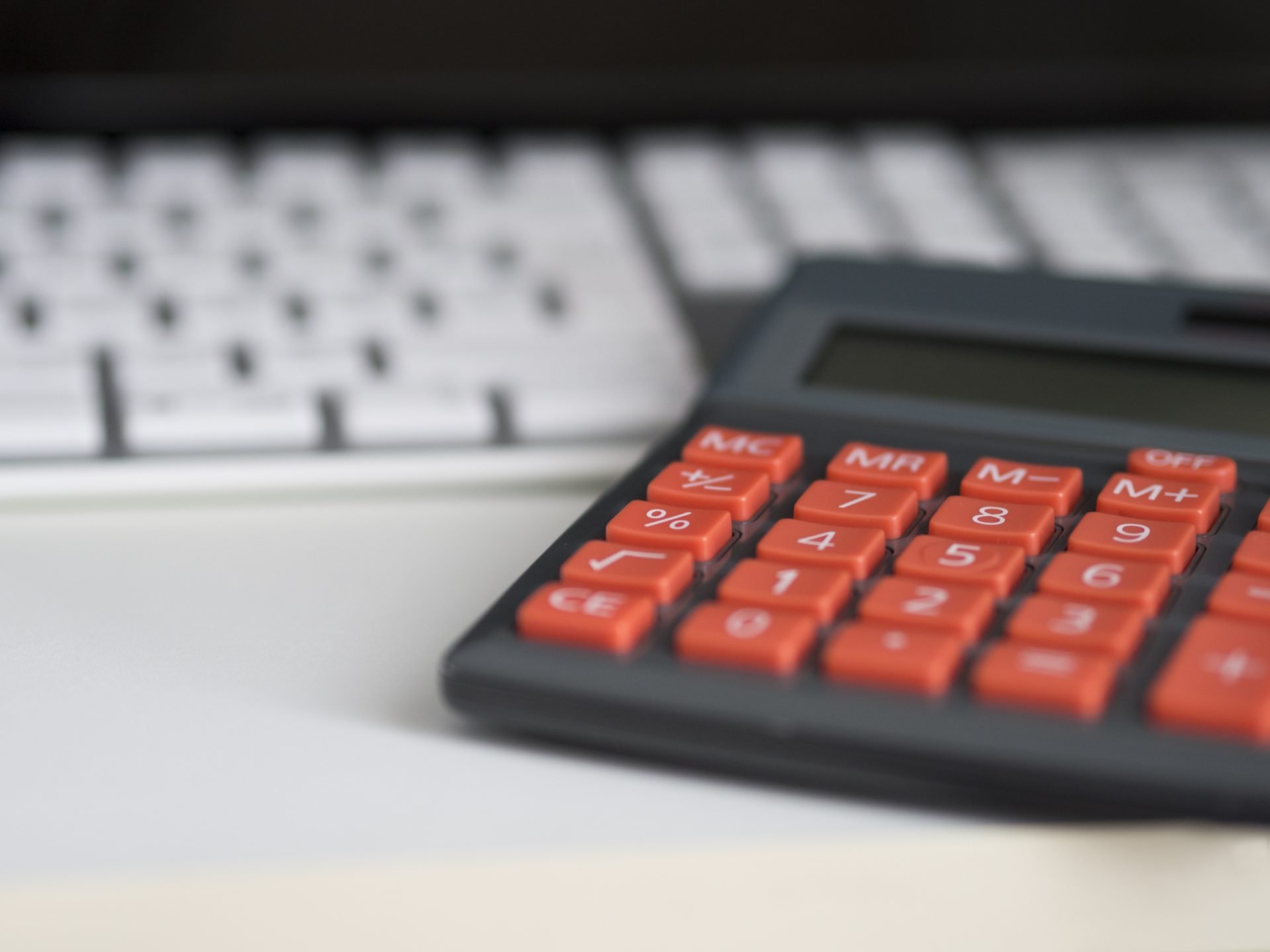 Calculator on a Computer Desk | Veteran Car Donations