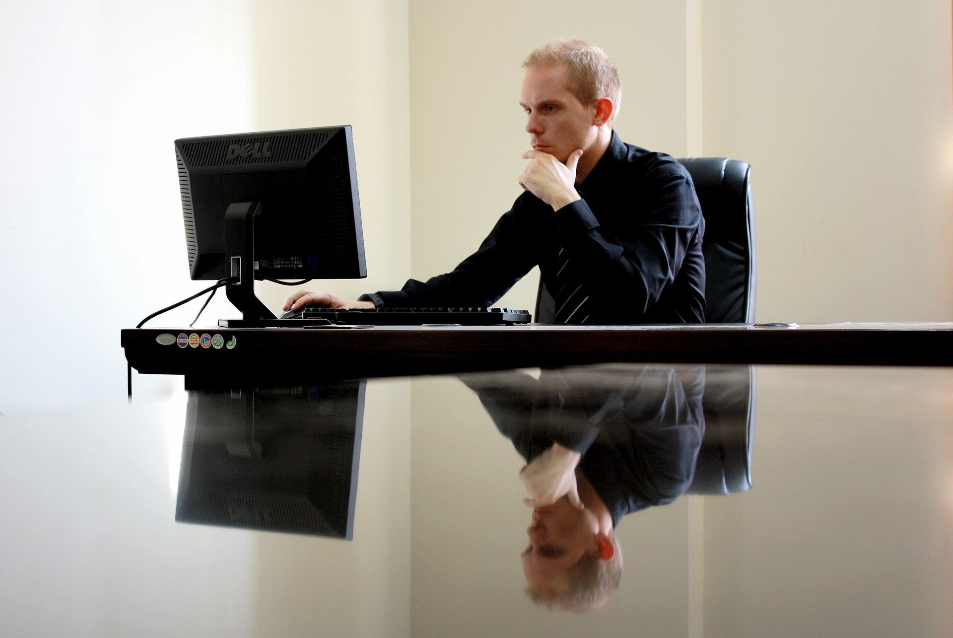 Man Choosing a Charity on His Computer | Veteran Car Donations