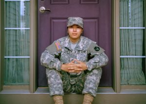 Sitting Military Woman | Veteran Car Donations