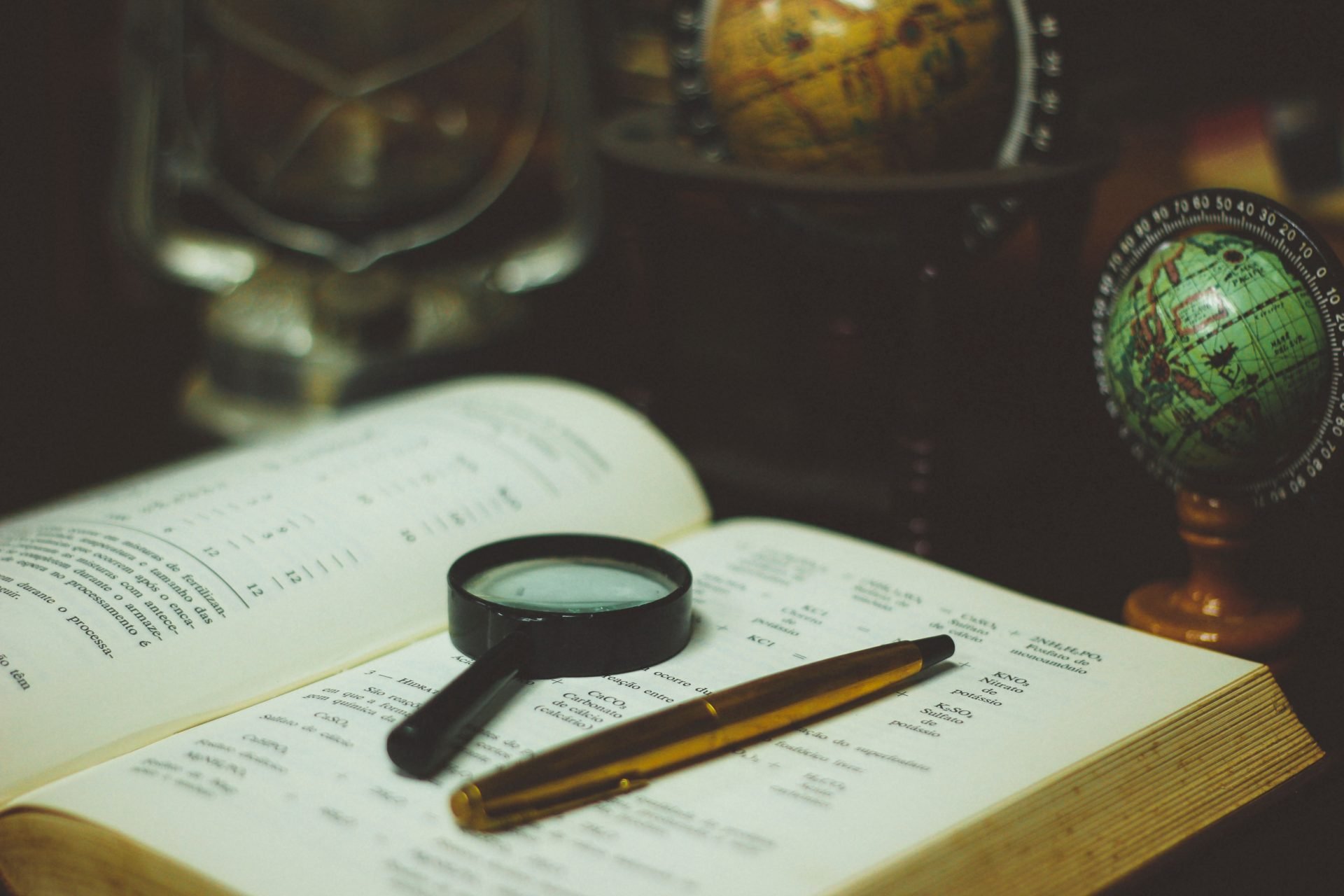 Magnifying Glass and a Book | Veteran Car Donations