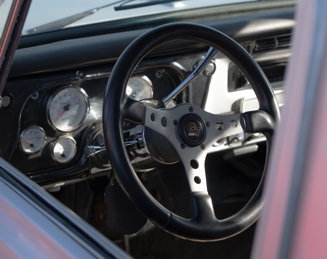 Steering Wheel in Vintage Car | Veteran Car Donations
