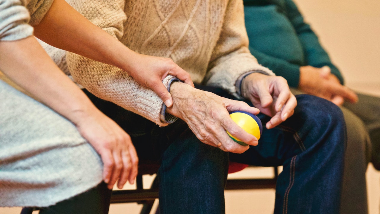 Person Holding a Stress Ball | Veteran Car Donations
