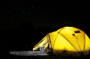 Yellow Tent at Night | Veteran Car Donations