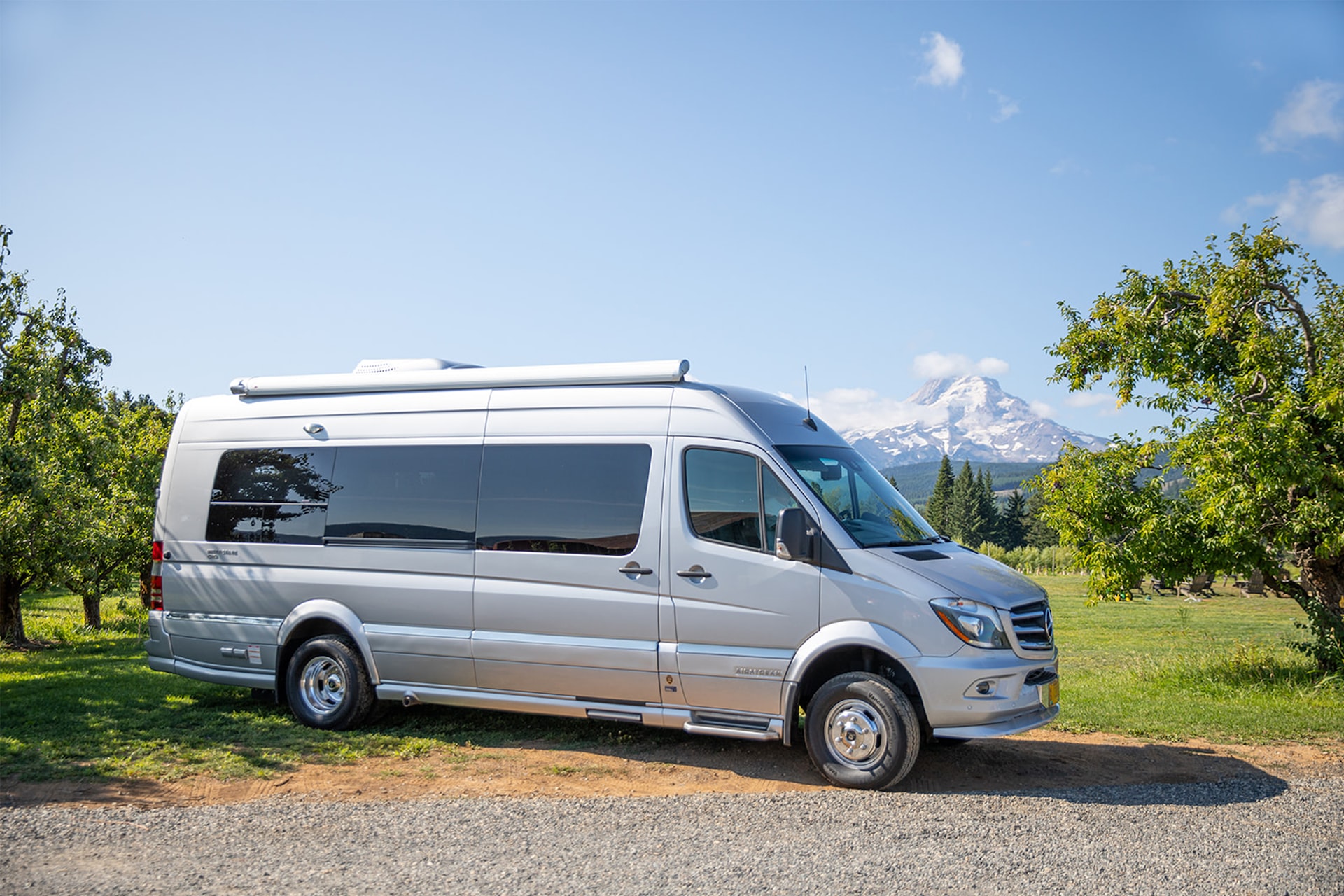 white van on road during daytime | Veteran Car Donations